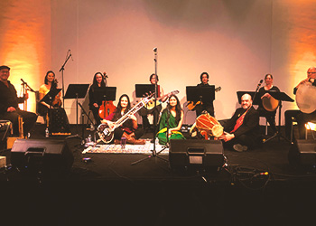Group shot of Saw Peep Ensemble on a stage