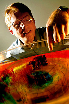 Dr. Tim Dowling showing off a display
