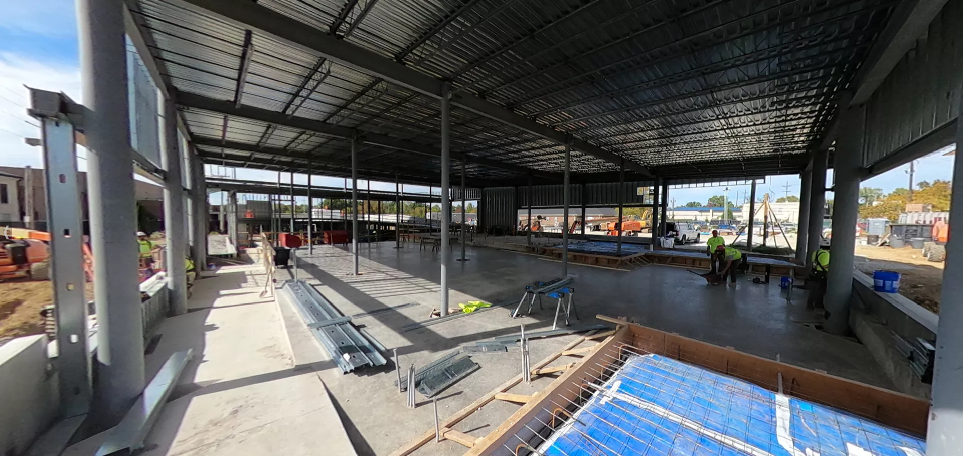 Construction workers working on the flooring