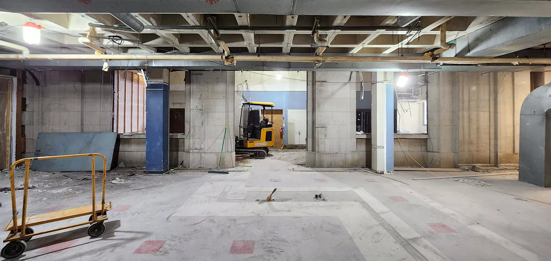 Cleared basement at the Main Library with a construction truck